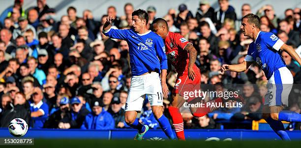 Everton's Belgian striker Kevin Mirallas vies with Southampton's English defender Nathaniel Cline during the English Premier League football match...