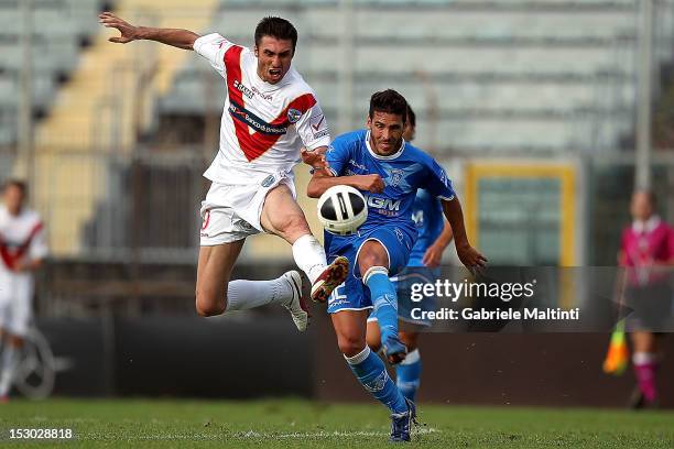 Stefano Accardi of Empoli FC battles for the ball with Andrea Caracciolo of Brescia Calcio during the Serie B match between Empoli FC and Brescia...