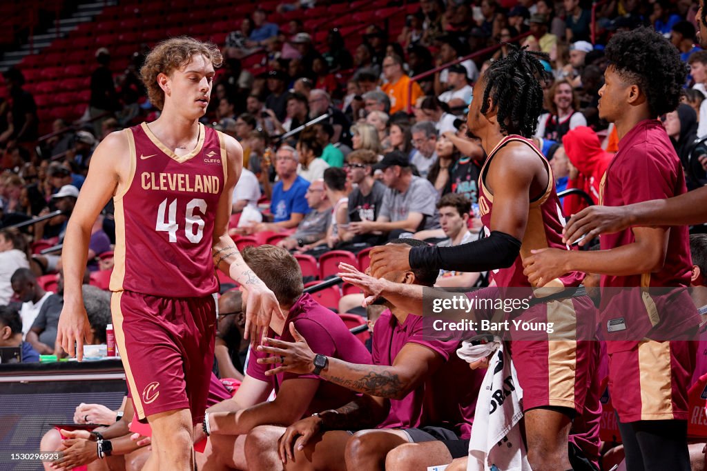 Luke Travers of the Cleveland Cavaliers walks off the court during