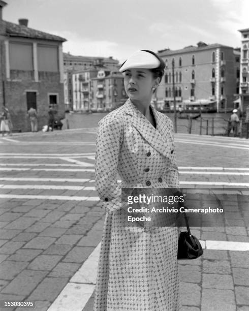 Model wearing Christian Dior fashions in Venice, 3rd June 1951.