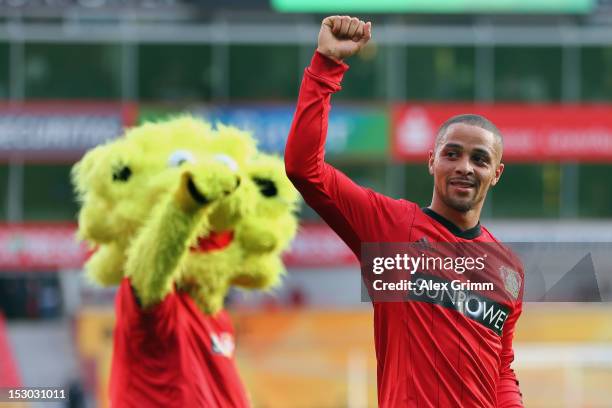 Sidney Sam and mascot "Brian the lion' of Leverkusen celebrate after the Bundesliga match between Bayer 04 Leverkusen and SpVgg Greuther Fuerth at...