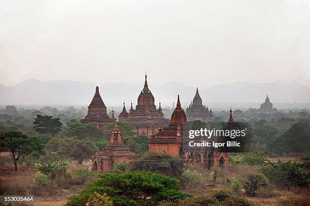 hazy morning in bagan - colle santa lucia stock pictures, royalty-free photos & images