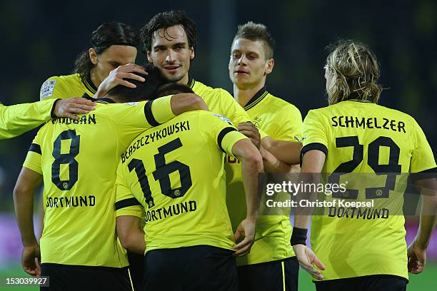 Jakub Blaszczykowski of Dortmund celebrates the fifth goal with his team mates during the Bundesliga match between Borussia Dortmund and VfL Borussia...