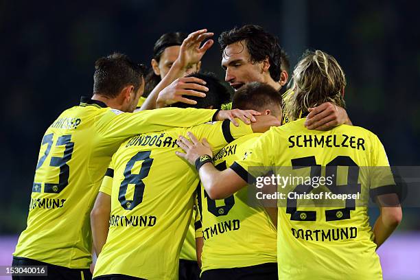 Jakub Blaszczykowski of Dortmund celebrates the fifth goal with his team mates during the Bundesliga match between Borussia Dortmund and VfL Borussia...