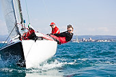 Men enjoying the sport of sailing