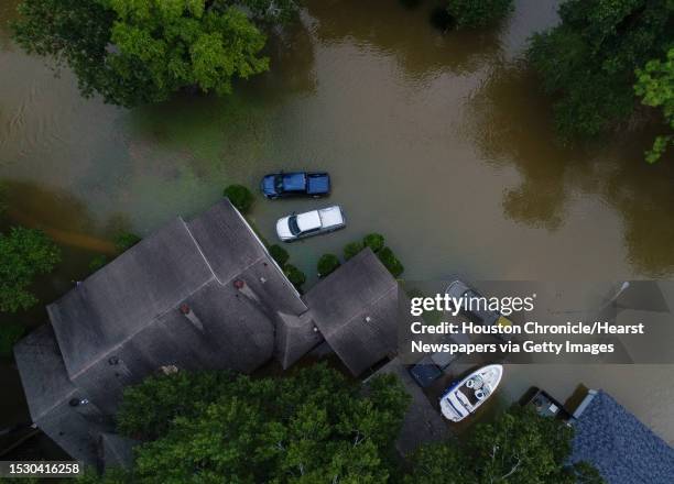 Flooded homes in the Lochshire neighborhood Friday, Sept. 20 in Huffman, Texas. Tropical Storm Imelda dumped 43 inches of rain in the greater Houston...