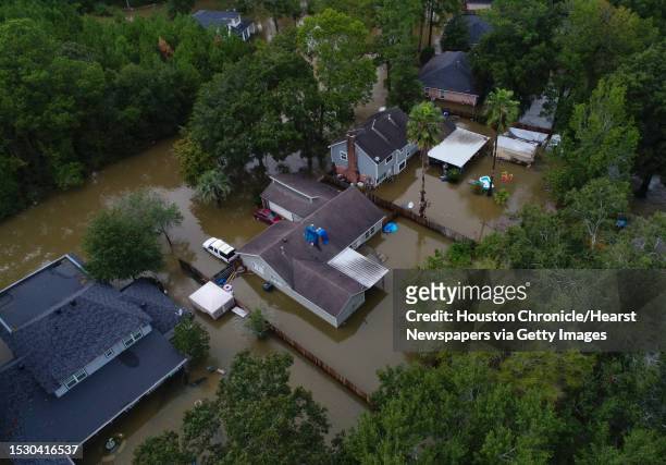 Flooded homes in the Lochshire neighborhood Friday, Sept. 20 in Huffman, Texas. Tropical Storm Imelda dumped 43 inches of rain in the greater Houston...
