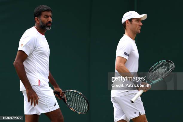 Rohan Bopanna of India and Matthew Ebden of Australia look on against Jacob Fearnley of Great Britain and Johannus Monday of Great Britain in the...