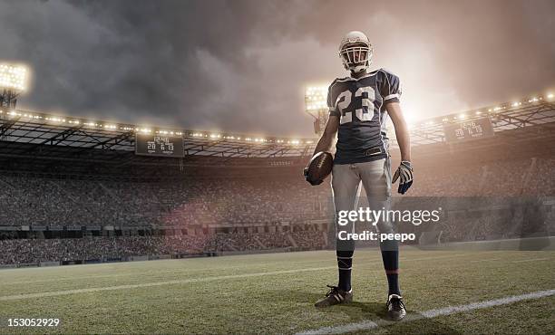 american football hero - football helmet stockfoto's en -beelden
