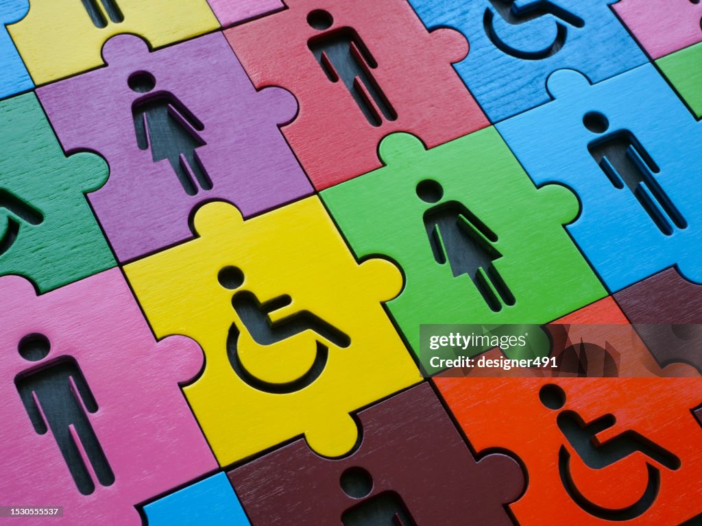 Diversity and inclusion. Multi-colored puzzle with figures of people.