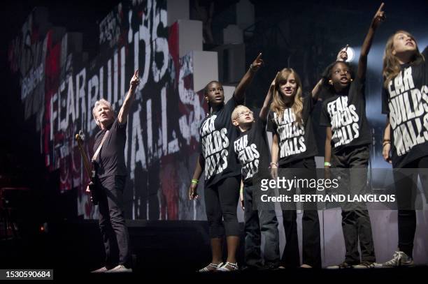 Roger Waters, bassist from the Rock group Pink Floyd, performs at a concert of The Wall at the Bercy POPB concert hall in Paris on May 30, 2011. AFP...