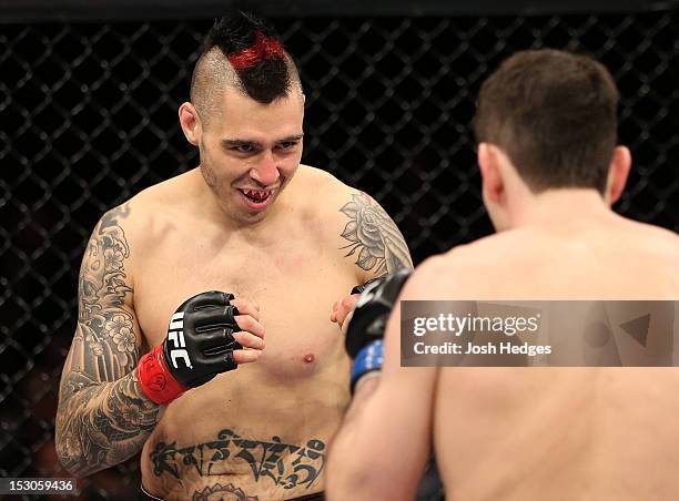 Dan Hardy squares off with Amir Sadollah during their welterweight fight at the UFC on Fuel TV event at Capital FM Arena on September 29, 2012 in...