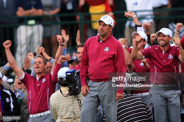 Europe team captain Jose Maria Olazabal watches alongside Luke Donald and Sergio Garcia on the 18th green during day two of the Afternoon Four-Ball...