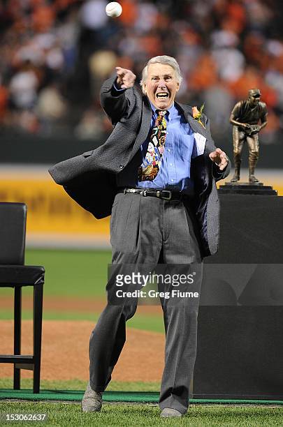 Former Oriole Brooks Robinson throws out the ceremonial first pitch before the game between the Baltimore Orioles and the Boston Red Sox at Oriole...