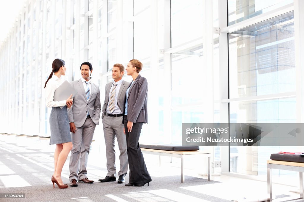 Business People Meeting in a Lobby