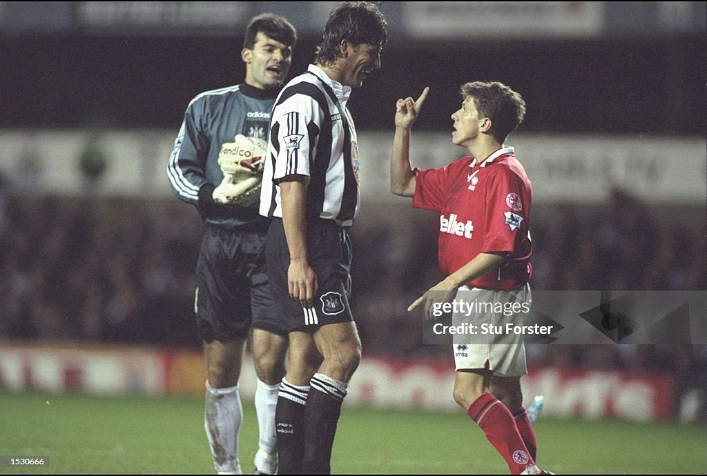 Phillipe Albert of Newcastle (right) confronts Juninho of Middlesbrough