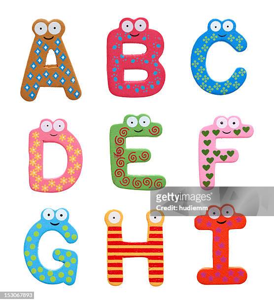 multicolor alphabet fridge magnet letters isolated on white background - bokstavsmagnet bildbanksfoton och bilder