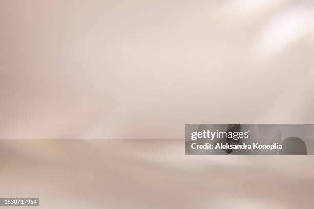 dreamy pink beige, pastel nude colored display background with disco crystal caustic light effect. empty 3d stage template. trendy natural colors - beigen hintergrund stock-fotos und bilder