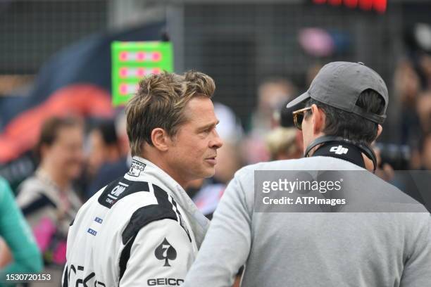 Brad Pitt and APEX Film crew on the starting grid during the F1 Grand Prix of Great Britain at Silverstone Circuit on July 09, 2023 in Northampton,...