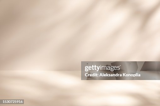 Empty Studio 3d exhibition background - pastel creamy pink beige stage with soft natural abstract diagonal window light and shadows. Empty Studio 3d exhibition background - pastel creamy pink beige stage with soft natural abstract diagonal window light and shadows.