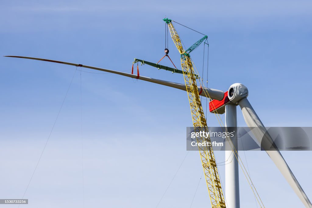 Generator Rotor Lift Wind Turbine Construction Site Giant Crane Lifts A Rotor Blade To The ...