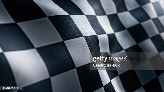 Waving Racing finish flag with checkered pattern texture in slow motion Waving Racing finish flag with checkered pattern texture in slow motion