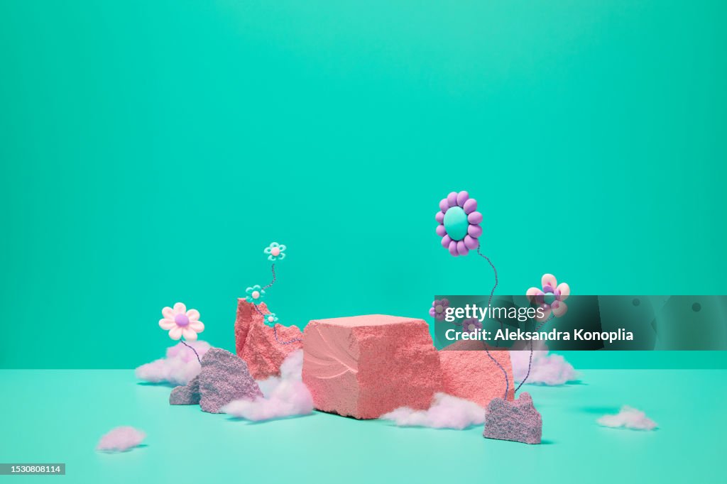 Abstract 3d stage with cute kawaii flowers, pink cotton candy and empty pastel purple and coral colored rocks podiums on green mint, turquoise, pink solid background with copy space