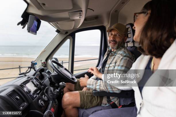 pulling up at the beach in our campervan - camper van stock pictures, royalty-free photos & images