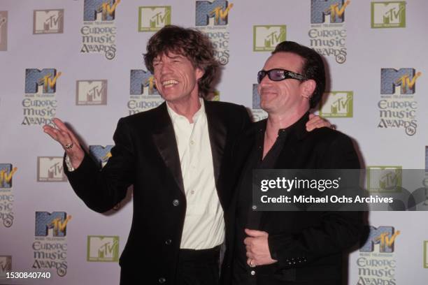 Mick Jagger and Bono during 1999 MTV Europe Music Awards Arrivals at The Point Depot in Dublin, Ireland, 19th November 1999.