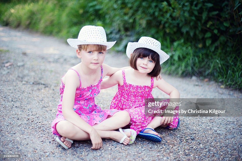 Sisters in cowboy hats