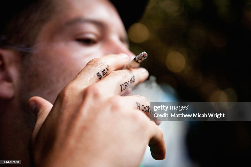 A man with a new finger tattoo.