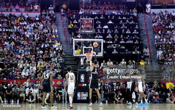 Victor Wembanyama of the San Antonio Spurs shoots a free throw against the Portland Trail Blazers in the first half of a 2023 NBA Summer League game...