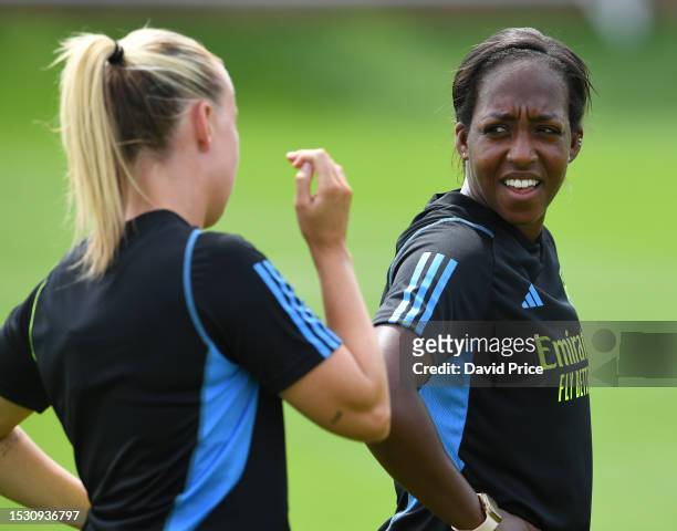 Former Arsenal Women's player Danielle Carter looks on during the Arsenal Women's training session at London Colney on July 10, 2023 in St Albans,...
