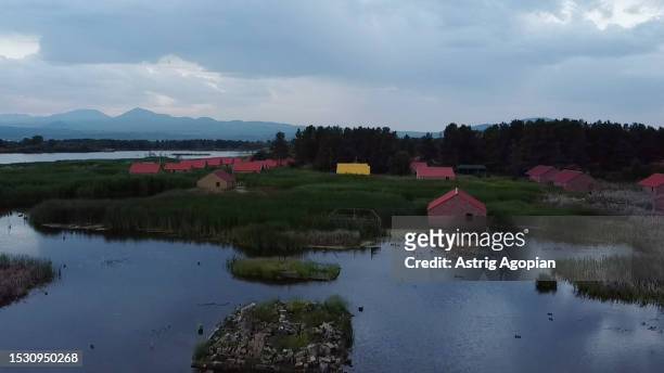 An aerial view of abandoned cottages after a rise of the water level at Lavanda City, following an attempt to regulate the level of Lake Sevan which...