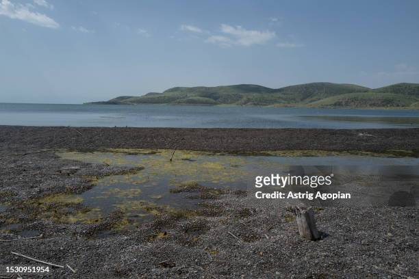 Bank of Lake Sevan near Port Ayas where the water level has visibly decreased on July 8, 2023 in Artanish, Armenia. Armenia's iconic lake is...