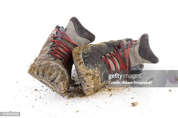 hiking dirty boots - old boots stock pictures, royalty-free photos & images