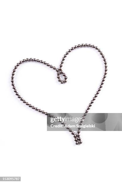 magnetic balls - heart - heart bracelet stock pictures, royalty-free photos & images