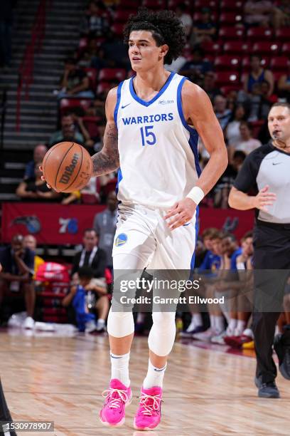 Gui Santos of the Golden State Warriors dribbles the ball during the game against the Houston Rockets during the 2023 NBA Las Vegas Summer League on...