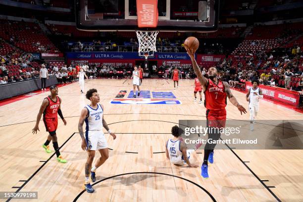 Cam Whitmore of the Houston Rockets drives to the basket during the game against the Golden State Warriors during the 2023 NBA Las Vegas Summer...