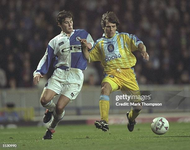 Gianfranco Zola of Chelsea gets to the ball ahead of Gary Croft of Blackburn. During the FA Carling Premier league match between Blackburn Rovers and...