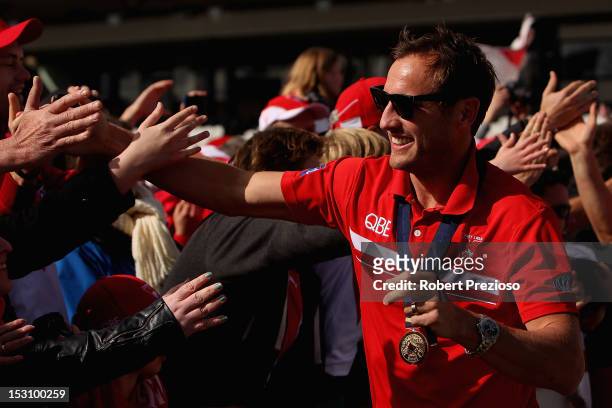 Jude Bolton arrives prior to Swans players being presented to supporters at Lakeside Stadium during a Sydney Swans official AFL Fan Day at Albert...