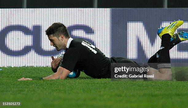 Corey Jane of New Zealand dives over for a try during a match between Argentina and New Zealand as part of the fifth round of The Rugby Championship...