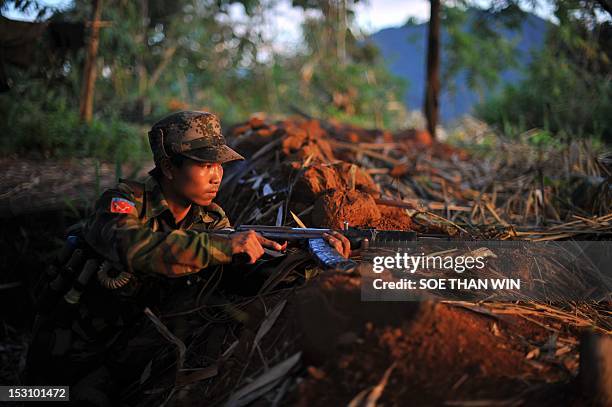 Myanmar-unrest-minorities,FOCUS' by Soe Than Win This picture taken on September 22, 2012 shows a soldier from the All Burma Students Democratic...