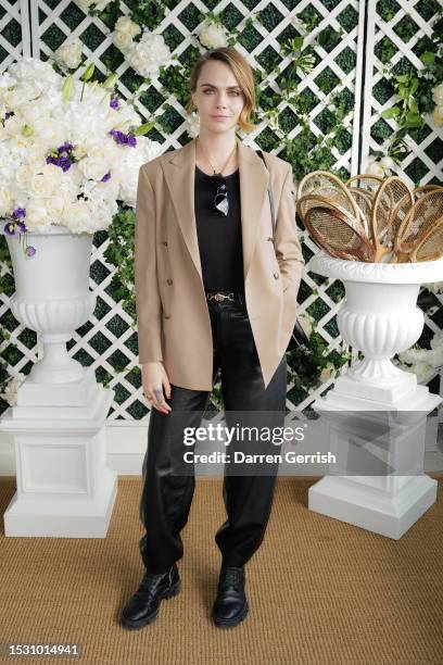 Cara Delevingne wearing Ralph Lauren, attends the Ralph Lauren Suite during The Championships, Wimbledon at All England Lawn Tennis and Croquet Club...