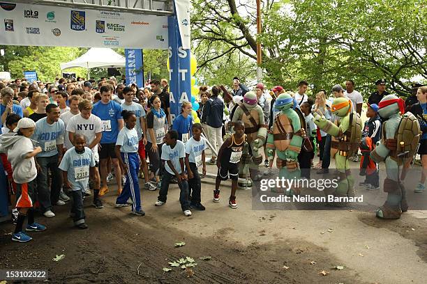 Leonardo, Raphael, Donatello and Michelangelo of The Teenage Mutant Ninja Turtles and Dora The Explorer attend the Nickelodeon World Wide Day of Play...