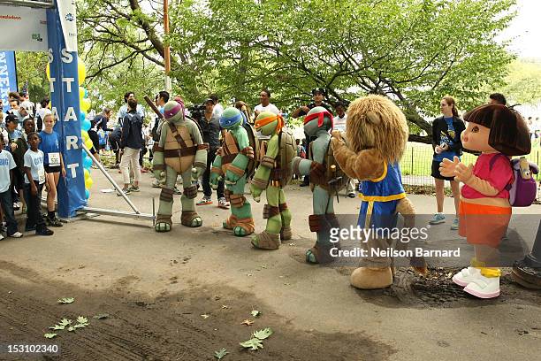 Leonardo, Raphael, Donatello and Michelangelo of The Teenage Mutant Ninja Turtles and Dora The Explorer attend the Nickelodeon World Wide Day of Play...