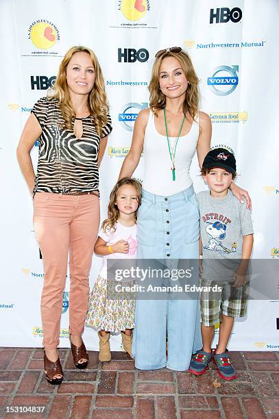 Eloisa De Laurentiis, Jade Thompson, celebrity chef Giada De Laurentiis and Julian Vaguelsy arrive at the L.A. Loves Alex's Lemonade Culinary Event...