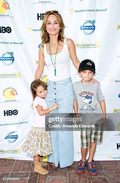 Celebrity chef Giada De Laurentiis , her daughter Jade Thompson and her nephew Julian Vaguelsy arrive at the L.A. Loves Alex's Lemonade Culinary...