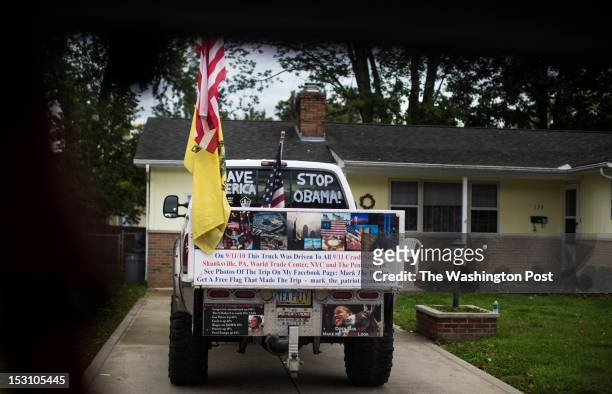 Tea Party inspired truck, parked in a residential neighborhood, plastered with anti Obama and support Governor Mitt Romney stuff is parked outside a...