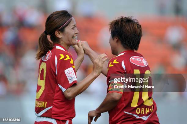 Nahomi Kawasumi of INAC Kobe Leonessa celebrates Shinobu Ohno's goal during the Nadeshiko League match between AS Elfen Sayama and INAC Kobe Leonessa...